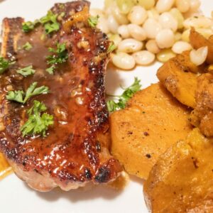 Gluten Free Honey Glazed Pork Chops, Candied Sweet Potatoes and Butter Beans Plated